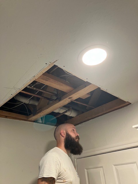 Square area of ceiling in need of drywall repair Conroe TX