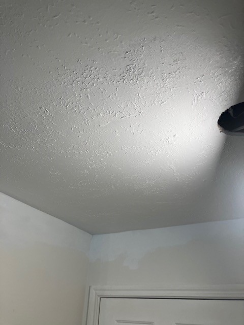 Drywall repair for somewhat large hole in a ceiling in Conroe Texas. Drywall Repair provided by WALLS BY WILLIAMS, paintersconroe.com